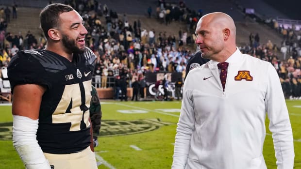 Nov 11, 2023; West Lafayette, Indiana, USA; Purdue Boilermakers running back Devin Mockobee (45) talks with Minnesota Golden Gophers head coach P.J. Fleck after defeating the Minnesota Golden Gophers at Ross-Ade Stadium. 